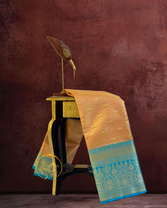 Peach Gold Kanjeevaram with Sky Blue Zari Border