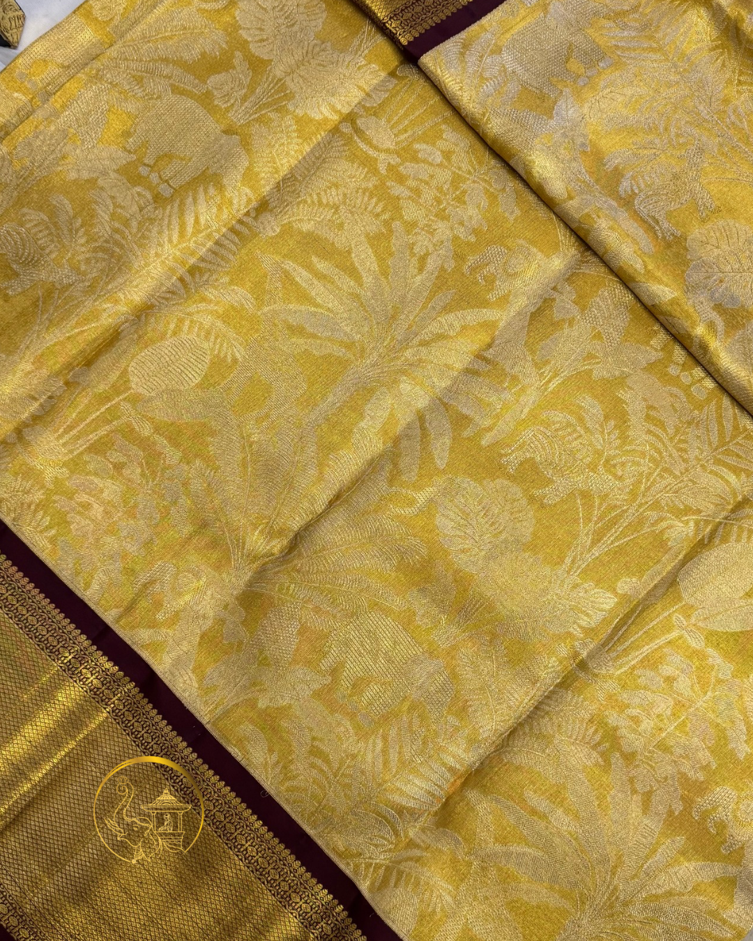 Golden Handloom Saree with Maroon Border 
with Nature inspired motifs