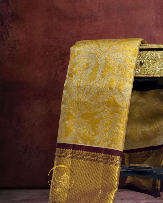 Golden Handloom Saree with Maroon Border 
with Nature inspired motifs